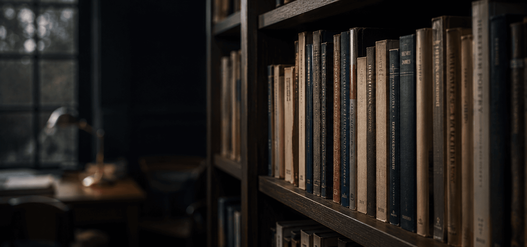 Bookshelf in a study, lit by a window